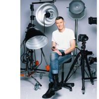 Markus seated on photoshoot set